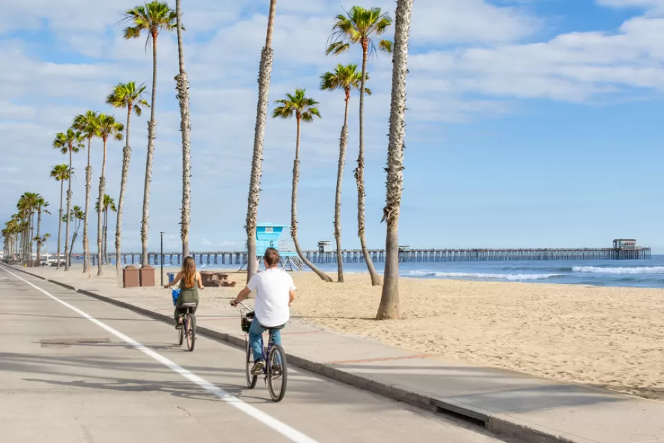 Two people on bikes in San Diego, California
